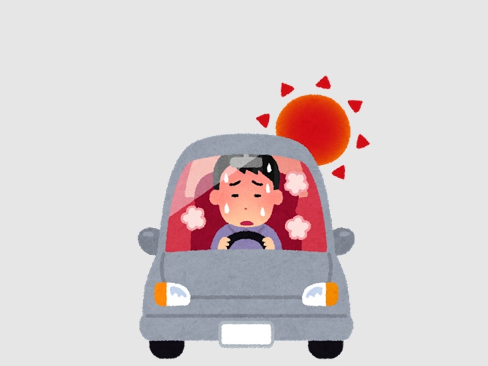 車内が暑くて辛い男性